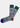 The Grey E-Gamer Sock features gray cotton with green cuffs, one blue toe, one red toe, and a video game controller pattern. Fits sizes 8-12. Made in Turkey.