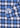 A close-up of the Norman Button Down—a men’s fashion staple in blue, black, and white checkered plaid—highlights part of the sleeve and cuff, featuring buttons and precise stitching details. The fine weave reflects the quality craftsmanship characteristic of classic European cotton shirts.