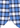 Close-up of the Norman Button Down, featuring blue and white plaid fabric with a curved hem and a small circular tag adorned with a checkmark—highlighting the meticulous craftsmanship and premium European cotton material that elevate this men’s shirt.