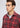A man wears a Superior Stretch Flannel red and black plaid button-down shirt over a grey crew-neck t-shirt.