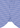 Close-up of the Swenson Button Down’s curved shirt hem with a blue and white houndstooth pattern, featuring detailed stitching and a small decorative fabric tab at the seam—classic details that define its tailored fit, making it an ideal choice for a refined business casual look.