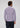 A man with short, curly hair is seen from behind wearing the Zerkel Stretch Button Down—a long-sleeved, wrinkle-resistant shirt with a striped design—paired with dark pants, standing against a plain, light background.